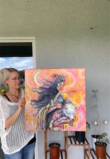 This piece is titled, “Lone Wolf.” It was the first painting I finished using ethereal techniques. What do you think she symbolizes? She is now available at www.michellegreenart.com or link in bio ✨ #art #artreveal #wolfart #mixedmedia #natureart