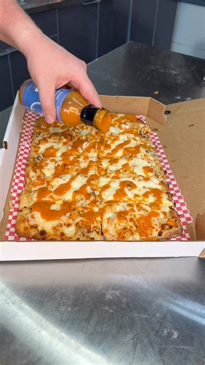 Hot Wing Pizza Tips! The enemies of a great buffalo chicken pizza are: 1. Broken down wing sauce2. Dried out chicken3. Poor proportionsIn order to prevent these things from happening, use these tips:1. Toss the chicken in buffalo sauce and layer the chicken UNDER the cheese. This protects the chicken from drying out and the sauce breaking down.2. Use chicken thighs instead of chicken breasts. They don’t dry out as easily.3. Drizzle wing sauce on top a couple minutes after the pizza comes out of 