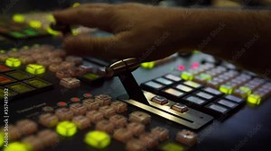 Broadcast Tv Studio Production - Vision Switcher Studio Director broadcast video mixer operation - Close-up of hand Stock Video