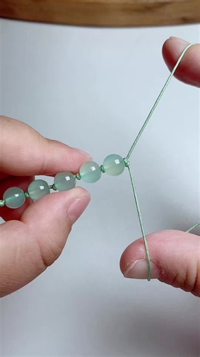 The art of precision. 🌿 Knotting between each natural stone bead to create a secure, beautiful, and fluid drape. Satisfying to watch, calming to wear. ✨ Link in bio to explore our handmade jewelry! ⁠#beadknotting⁠ ⁠#handcraftedjewelry⁠ ⁠#gemstonebracelets⁠ ⁠#satisfyingcrafts⁠#handmadejewelry