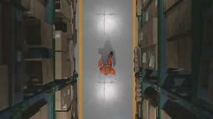 3D animation of a warehouse with an 3D employee walking next to the shelving unit. Top view.