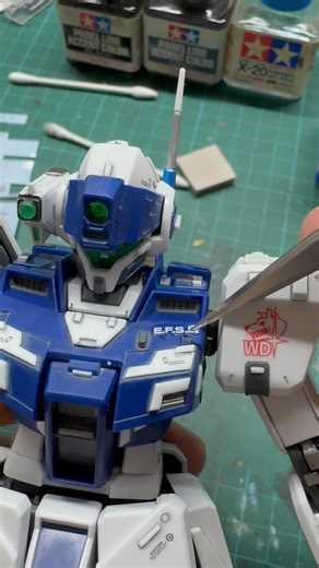 KK on Instagram: "Panel lining with Tamiya Panel line accent Grey and wet decals applications. Waiting for rain to pass before spraying Matt clear coat and weathering works #gundam #gunpla #rgm79sp #rgm79spgmsniperiiwhitedingoteamcustom #mastergrade #panelline #tamiya #wetdecals"