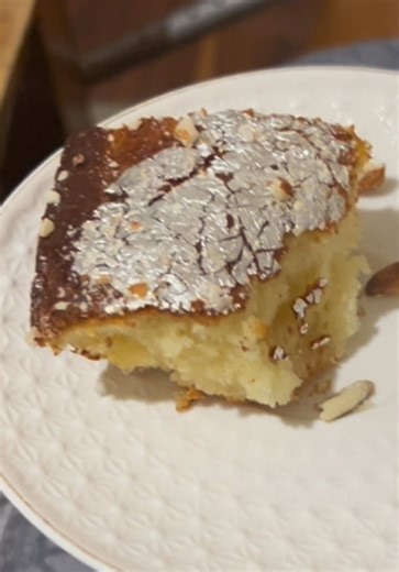 For cake batter: - 1 cup of milk powder - 1/2 cup of all purpose flour - 1/4 tsp of baking soda - 1 tsp of baking powder - 1/4 tsp cardamom powder - 1/4 cup ghee or melted butter - 1/2 cup of sugar - 1/2 cup of yogurt - 1/4 cup of milk - 1 tsp rose water For sheera syrup - 1 cup sugar - 1 cup water - 1/4 tsp cardamom - 1 tsp rose water - few saffron strands optional Method 1. Make sheera first - boil sugar and water 5 to 6 minutes until slightly sticky - add cardamom rose water and saffron - kee
