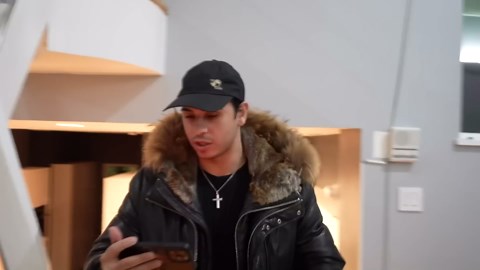 Tense argument escalates as driver forces entry and destroys front gate