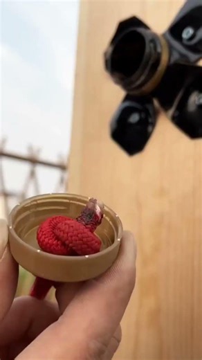 Simple trick make a hanging wall clothesline using recycled bottle caps and rope creatively at home