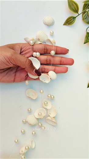 Turn simple seashells into a dreamy wall hanging 🌊✨#diy #shorts
