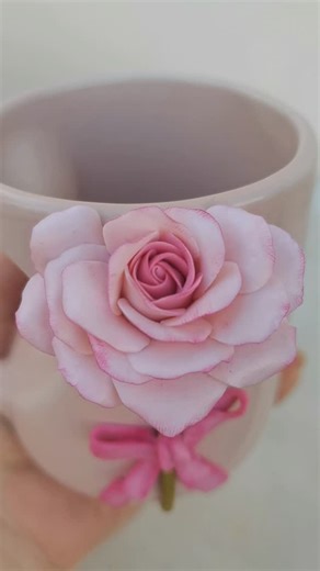 Dina Ahmed Shawqi on Instagram: "🤍🌷 #art #mug #roses #polymerclay #decamber"