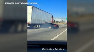 Semi drags car down I-294 in shocking dashcam video as driver waves out window | VIDEO