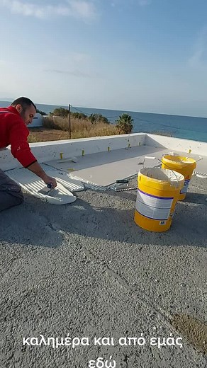 Working on a Flat Rooftop: Coastal Construction Scene