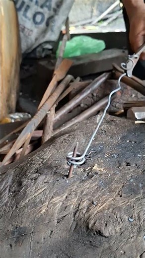 This is the technique for straightening a mini coiled spring.#automobile #america #blacksmith #usa