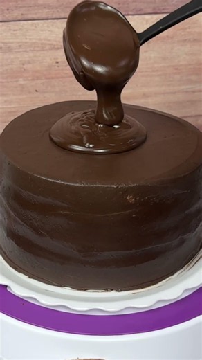 Satisfying Chocolate Ganache Poured Over This Cake Is Impossible to Ignore