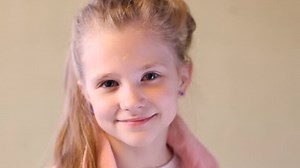 Little girl looking at the camera.