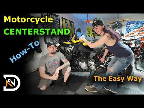 How to use a motorcycle center stand