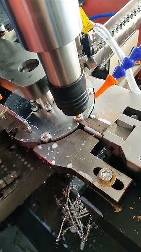 Rotary nut automatic tapping machine