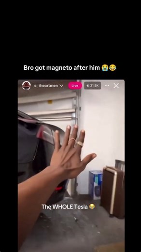 Aqonira | The video captures a raw, unfiltered Instagram Live stream where a person frantically gestures toward a Tesla in a cluttered garage, their... | Instagram