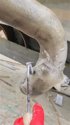 This step repairs a damaged stainless steel pipe using FRP. #frp