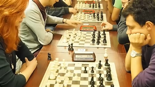 The mysterious red-haired lady captivated the board, delivering a truly impressive performance against the Grandmaster. | Chess Champ