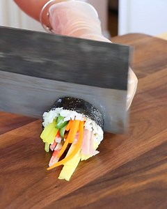 This Homemade Korean Kimbap Beats Store-Bought Every Time! 🔥 Colorful, savory rolls packed with rice, eggs, veggies, and classic fillings—perfect for lunch, picnics, or meal prep! Short-grain rice, eggs, sesame oil, carrots, red bell pepper, cucumber, ham, crab sticks, pickled radish, braised burdock, roasted seaweed, and more. 📝 Full video printable recipe in the comments! 💛 Craving this? Save it & share with a friend! #koreankimbap #kimbap | CiCi Li