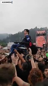 This man in a wheelchair got to have a very memorable experience at a metal concert when a group of guys grabbed onto his chair and lifted him up. | The National Desk - TND