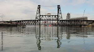 Water Reflection of Steel Bridge with Train in Portland OR