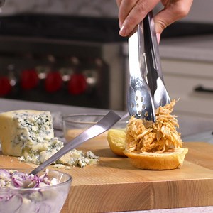 Elevate your Game Day with the ultimate Slow Cooker Buffalo Chicken Sliders. INGREDIENTS 3/4 cup hot sauce 3 tablespoons butter, melted 1 teaspoon salt 1/2 teaspoon ground black pepper 3 pounds boneless, skinless chicken breasts Slider buns, split 1/2 cup mayonnaise 4 teaspoons hot sauce Blue Cheese Coleslaw DIRECTIONS In a slow cooker crock, combine 3/4 cup hot sauce, butter, salt and black pepper. Add chicken breasts and turn to coat with hot sauce mixture. Cover slow cooker and cook on HIGH f