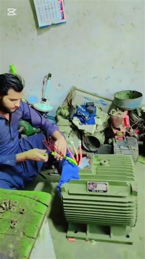 Star-Delta Connection in a 55 kW Motor – Wiring the Connection Box."