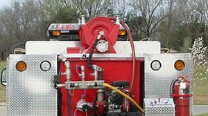 When to pull the fire rig's booster line, assuming it has one