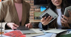 Event planners evaluating theme colors in collaborative meeting. Team discusses color palettes, design ideas, and decoration. Creative planning enhances event themes and coordination.