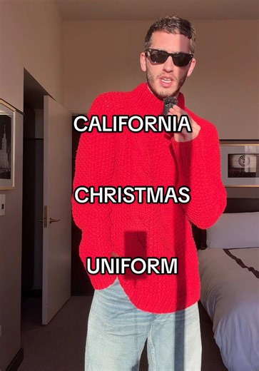 nothing says CA Christmas like a big red sweater, blue jeans and a black shoe