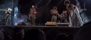Brass Against Singer Pees On Fan Onstage (VIDEO)