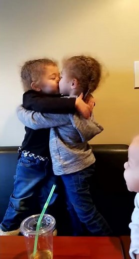 Kissing identical twins