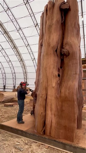 850K views · 15K reactions | Dan and Kayley making a massive log post even cooler with a coat of stain邏 | Langberg Log Homes | Facebook