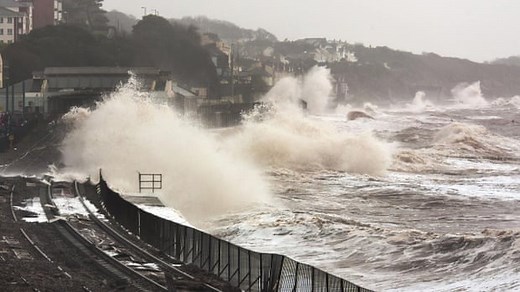 UK storms: Dawlish seawall collapses and rail tracks battered by extreme weather - video