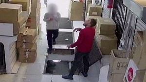 Security cam captures a boy falling down a hole. See what happened next