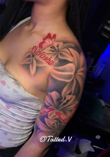 Creative Shoulder Tattoo Design with Greys and Red Ink