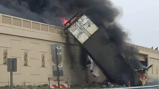 Semi-truck plunges 30 feet off highway turning into a fatal fire ball