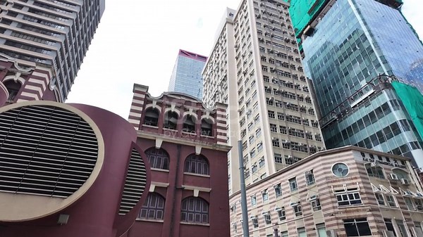 Hong Kong Bustling Sheung Wan streets with traditional shops and...