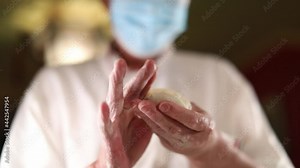 Forming Chinese gyoza dumplings by hand to be steamed or boiled