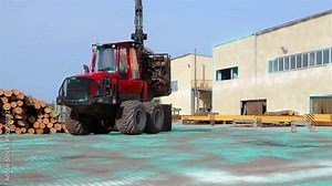 Working process at the sawmill. Special equipment travels through the territory of the sawmill. The work of artificial intelligence at a modern sawmill