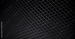 Black grid motion background. Black metal wire mesh texture surface. Used as a background and texture.