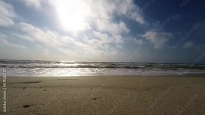 waves on sandy beach. The beach on the shores of sea. Time lapse