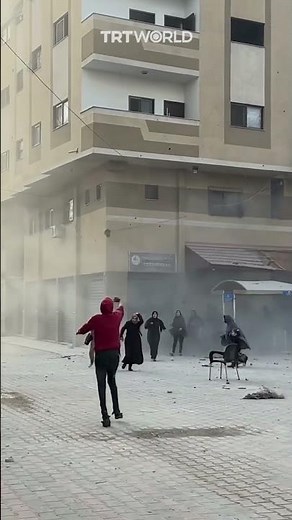 The moment Israel hit a residential building in Gaza as Palestinians were fleeing