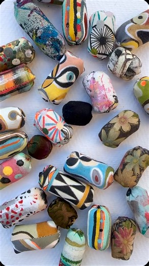 Laura Honse on Instagram: "Many years ago, before working with wood, I made jewelry from hand painted paper and textiles. Here are some surviving hand painted fabric beads from that period. Among them are a few made from vintage fabric my mother gave me, she used to work at a textile archive in New York that even had fabrics from Marie Antoinette. During this period, I also painted landscapes on huge pieces of fabric which were sewn up and sold to be used as shawls or hung on the wall. One was a