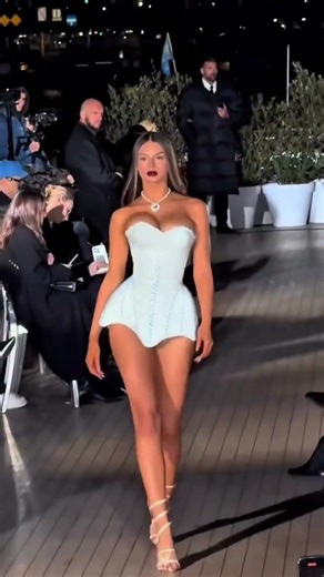 To order this ice blue corset mini dress DM A sculpted strapless corset silhouette designed to