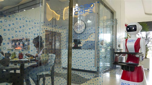 Robot waiters in Kenya create a buzz, but there are concerns about what it means for human labor