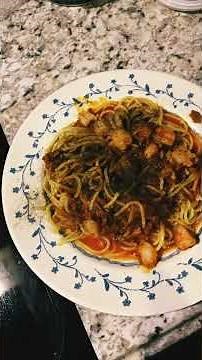 #making spaghetti pasta with red clam sauce and white clam sauce with frozen shrimp
