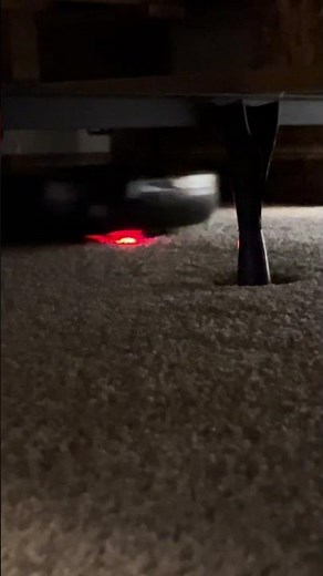 Lg Hom-bot cleaning under a bed