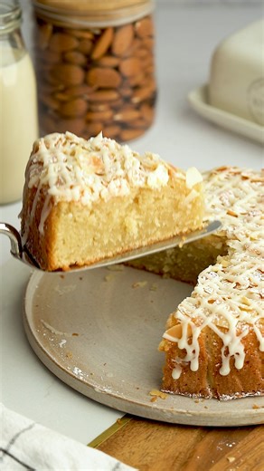 Moist, tender, and full of almond flavour. This vegan almond cake is topped with crunchy flaked almonds and finished with a sweet almond glaze. A dream for almond lovers - and it just so happens to be eggless, dairy-free, and gluten-free. 💬 Comment YUM or RECIPE and I’ll send you the link, or head to addictedtodates.com to save it for later. https://addictedtodates.com/gluten-free-vegan-almond-cake/ | Addicted to Dates