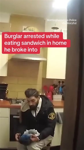 Watch the shocking moment a burglar was arrested while eating a sandwich in the home he had broken into. #Burglar #Shocking #Crime #Thief
