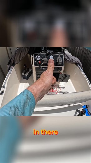 A corroded wire created a fishing nightmare. After discovering the crusty green mess, the repair process begins. Zip ties and a little elbow grease later, the transducer is almost ready to go. One step closer to smooth sailing! #FishingRepair #DIYFishing #BoatLife #Transducer #WireProblems | Born Again Boating